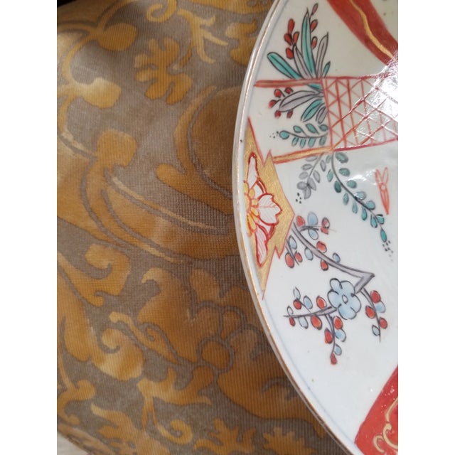 Beautiful antique Japanese 11" plate or charger with classic Imari colors.