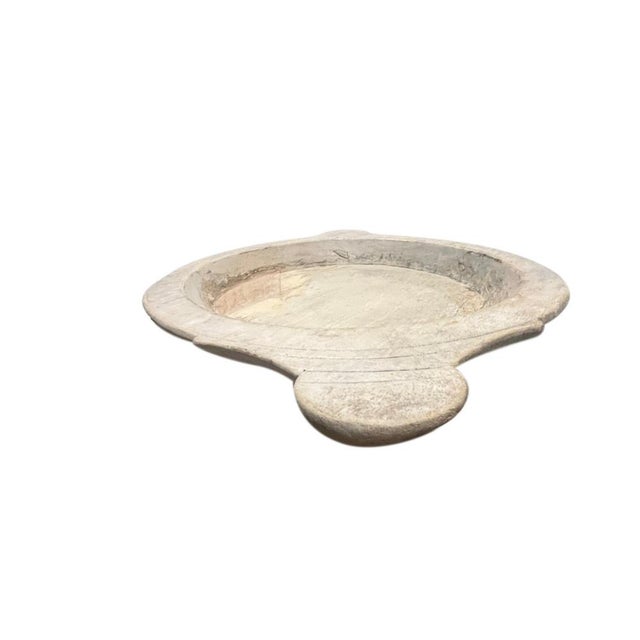 This vintage wood Parat bowl from India was once used to knead bread dough. It is a beautiful rustic piece and can be used...