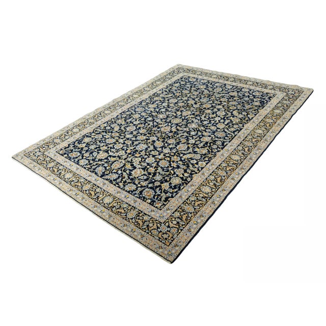 A masterpiece of classic knotting art! This magnificent Kashan rug was elaborately hand-knotted from high-quality cork...