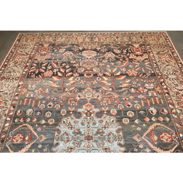 An early 20th Century Persian Bakhtiari Odd room size Carpet