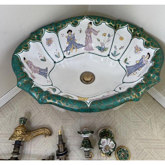 Vintage Sherle Wagner Chinoiserie Hand-Painted Porcelain Sink & Gilt Faucet Set Description: Transform your powder room...