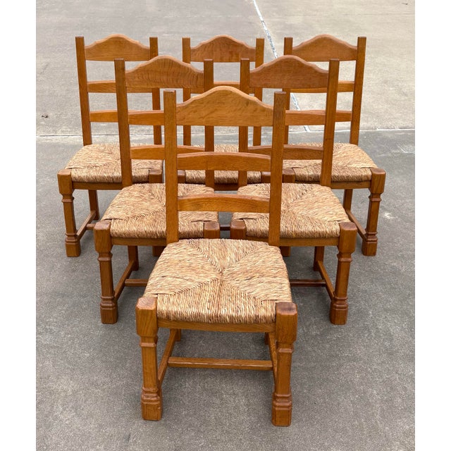 Nice, heavy French country ladder back dining chairs with rush seats. Very substantial and sturdy