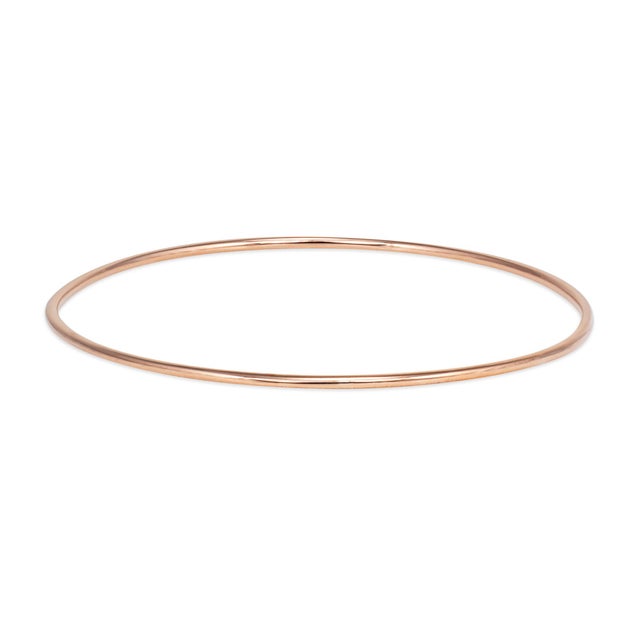 Chic vintage bangle bracelet crafted in 19 karat Portuguese rose gold (circa 1980s). Simple and elegant, the bangle is...