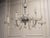 Elegant and refined 1970s Murano glass chandelier, attributed to Venini, one of the most renowned glassmakers from Murano,...