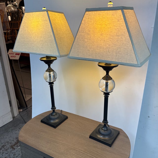 Design Plus Gallery presents a Pair of Restoration Hardware Crystal Ball Table Lamps. Each lamp has a clear crystal orb...