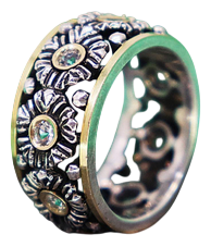 Gold and Silver Ring with Flower-Shaped Reliefs