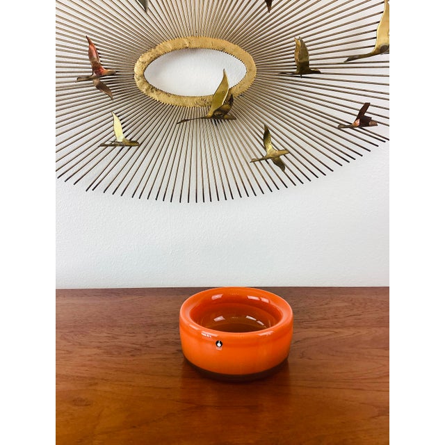 Vintage 1960s Eva Englund Art Glass Bowl made of super thick cased glass orange in color original sticker intact by Eva...