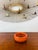 Vintage 1960s Eva Englund Art Glass Bowl made of super thick cased glass orange in color original sticker intact by Eva...
