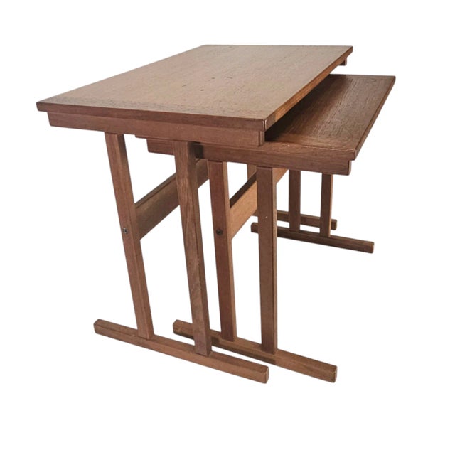 This NH Collection Danish teak nesting table set captures the essence of mid-century modern Scandinavian design. Featuring...