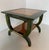 This coffee table was produced in Italy in the 80s a it is in green aniline with a fine maple inlay reminiscent of the...