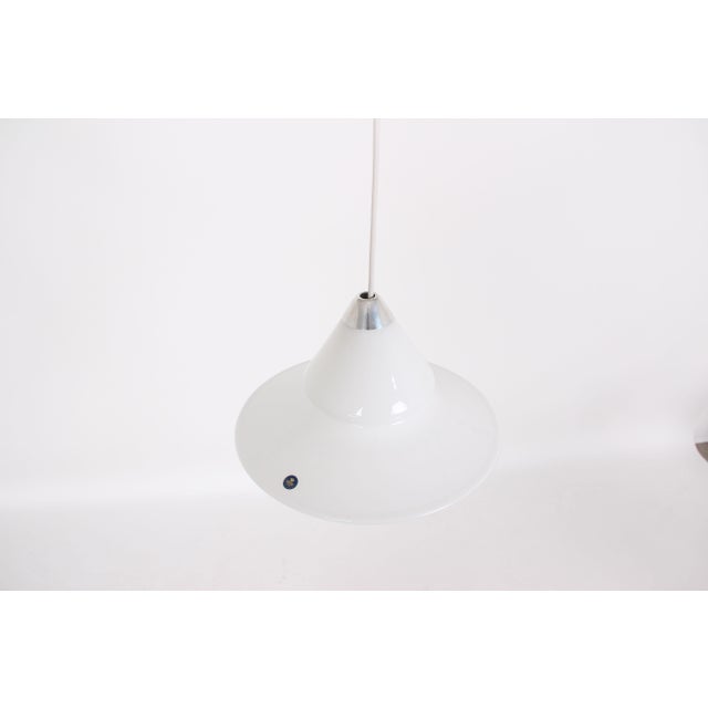 Pendant lamp made of milky-white, mouth-blown glass, designed by Torben Jørgensen for Holmegaard Glasværk. Diameter:...