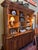 Impressive Ralph Lauren Home solid pine bookcase and display hutch in a classic English Country style. This substantial...
