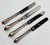 Set of four silver plated knives with the insignia for Vergeze, the Source Perrier Collection. Substantial weight to the...