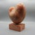 An abstract marble sculpture on original marble base. Dimensions: H 30cm W 15cm D 11.5cm Origin: English Date: Circa 1970