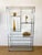 Vintage 1970s milo Baughman Style Chrome Etagere made of metal with chrome surface multiple glass shelves for display made...