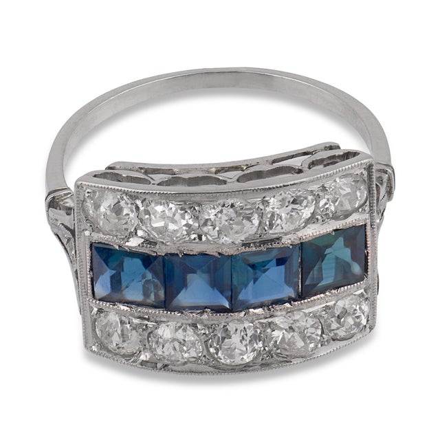 A refined treasure of the 1930s, this authentic Art Deco ring showcases ten luminous old European cut diamonds arranged in...