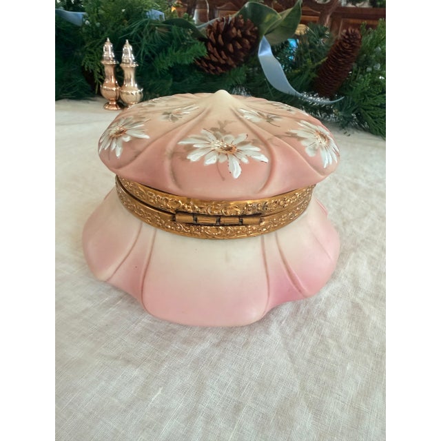 An antique C.F. Monroe "Nakara" jewelry box from the Victoria Era. Intricate rare floral design and unique lid design not...