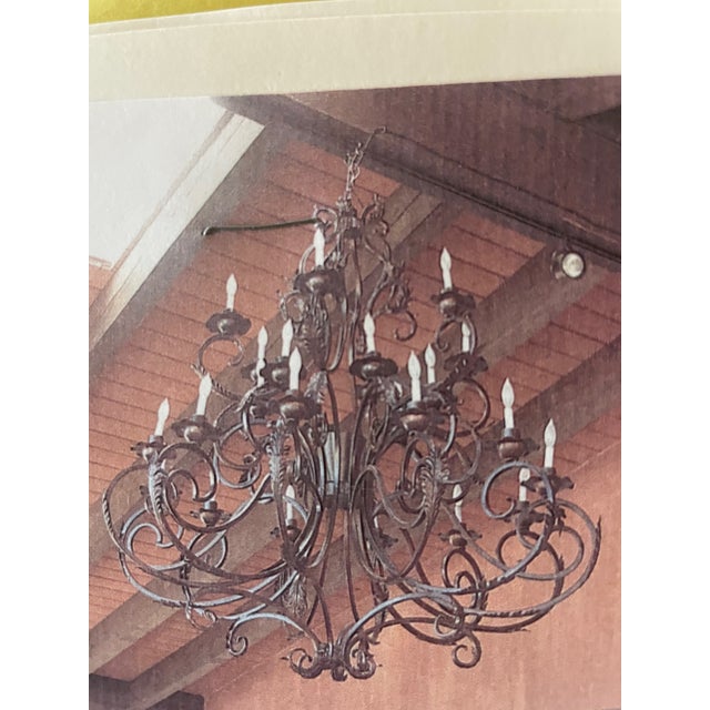 Rustic Large Chandelier hand made in Mexico. Pre own used in covered patio. Good condition, works, new white candle...