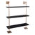 Modern multi-tier shelf in aged brass and black shelves, details urban simplicity with burnished finishes. Marais Shelf...