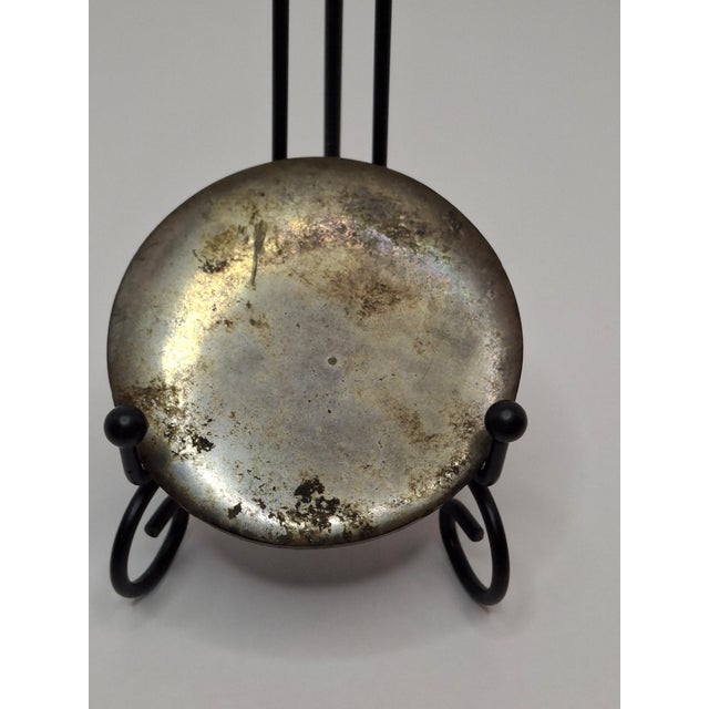This exquisite Song/Jin Dynasty bronze mirror (c. 960–1234 AD) is not only a functional grooming object but a powerful...