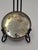 This exquisite Song/Jin Dynasty bronze mirror (c. 960–1234 AD) is not only a functional grooming object but a powerful...