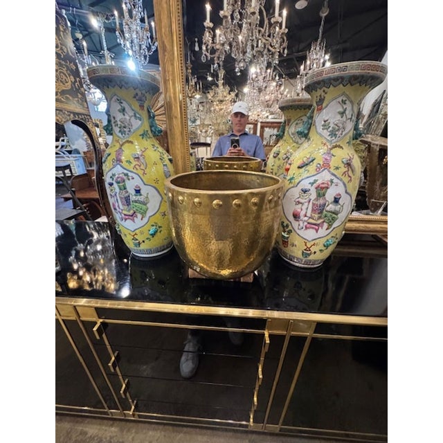 The Vintage English Brass Jardinere is a decorative collectible that adds a touch of elegance to any space. Its vintage...