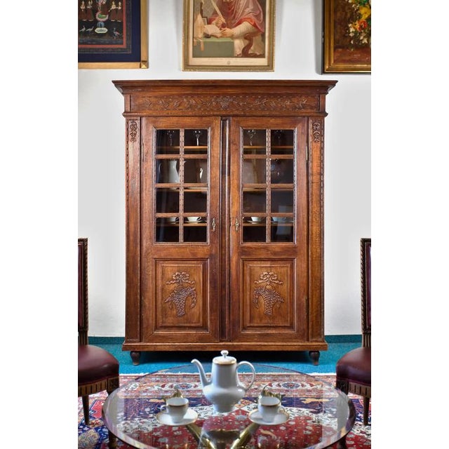 Representative double-winged bookcase - showcase made of solid oak wood, made at the end of the 19th century in the...