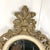 Elevate your interior with this striking pair of ornately carved wall mirrors, inspired by classic Italian Baroque design....
