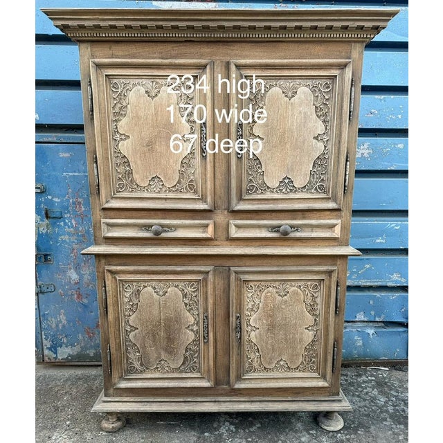 A superb French double Height Oak Cupboard. Full or character and Dating to the 18th Century and made from solid Oak which...