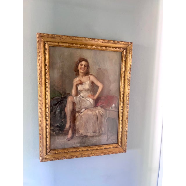 An original Italian oil painting: Portrait of an Elegant Seated Woman by Attilio Toro (1892–1982), housed in a suitable...
