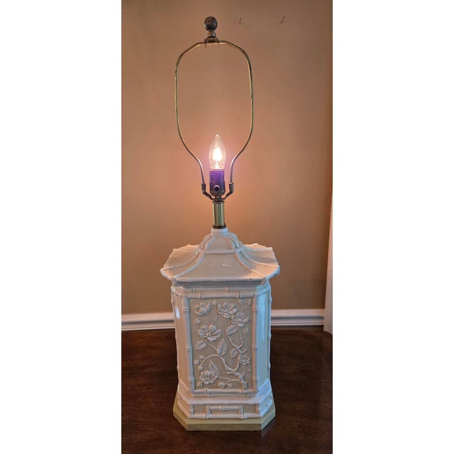 Bring timeless Hollywood Regency elegance into your space with this stunning vintage glazed ceramic pagoda lamp. Featuring...