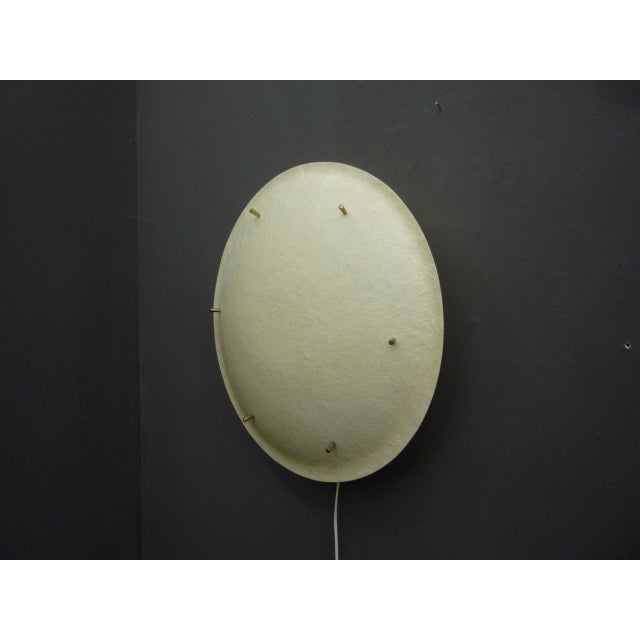 Fantastic space-age UFO lamp. Suitable for the ceiling or as a wall lamp. Excellent and working original condition....