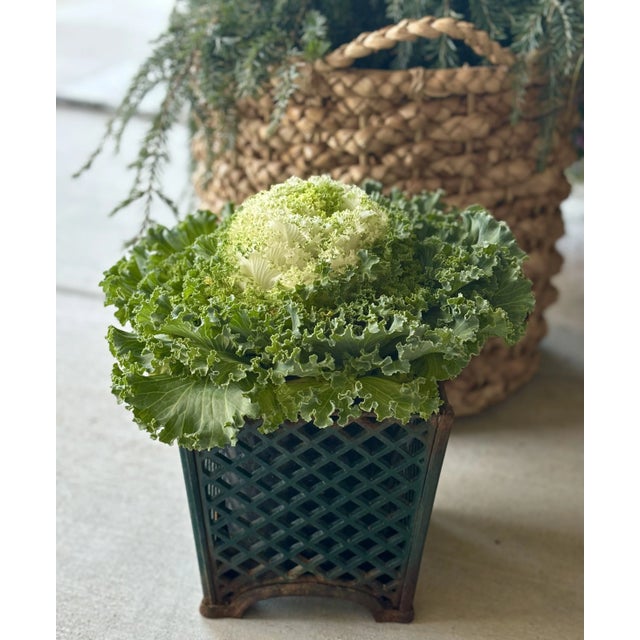 Antique table top cast iron jardiniere with reticulated diamond patterned sides CIRCA: Early 20th Century MAKER'S MARK:...