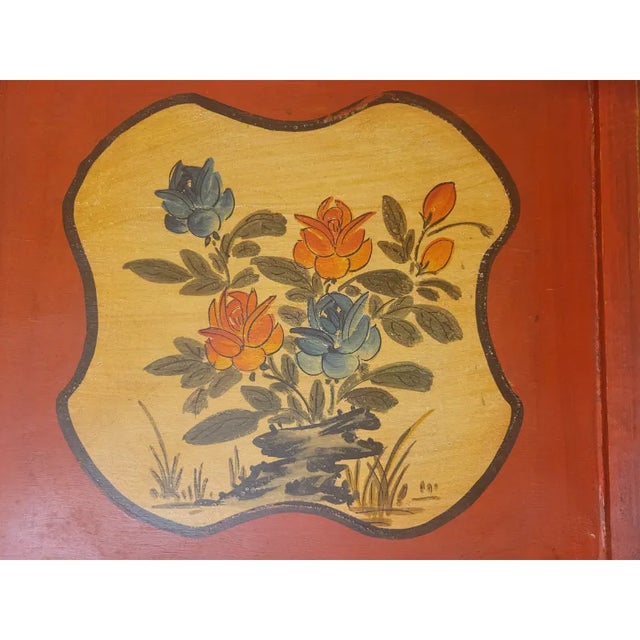 This is a beautifully decorative antique Chinese tray with floral accents, worn paint, and great patina. Well-constructed...