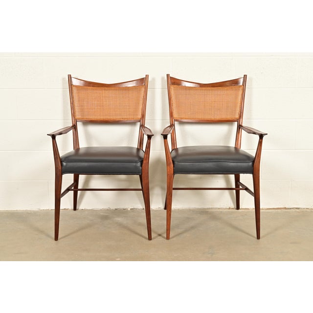A gorgeous pair of Mid-Century Modern club chairs or dining armchairs By Paul McCobb for Directional USA, 1950s Sculpted...