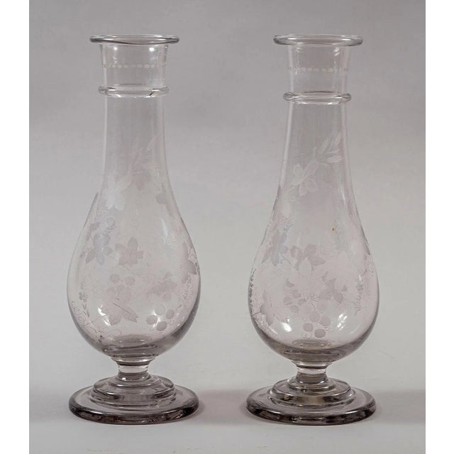 Pair of Regency hand-blown baluster-shaped glass vases etched with leaves and vines. Tiny scratches.