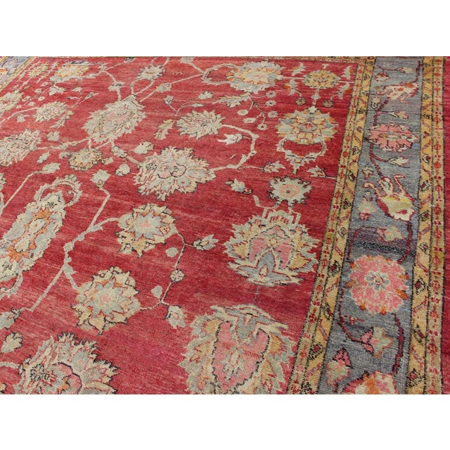 Early 20th Century Early 20th Century Antique Turkish Oushak Rug in Red Blue/Gray Border L. Green Yellow & Pink For Sale - Image 5 of 11