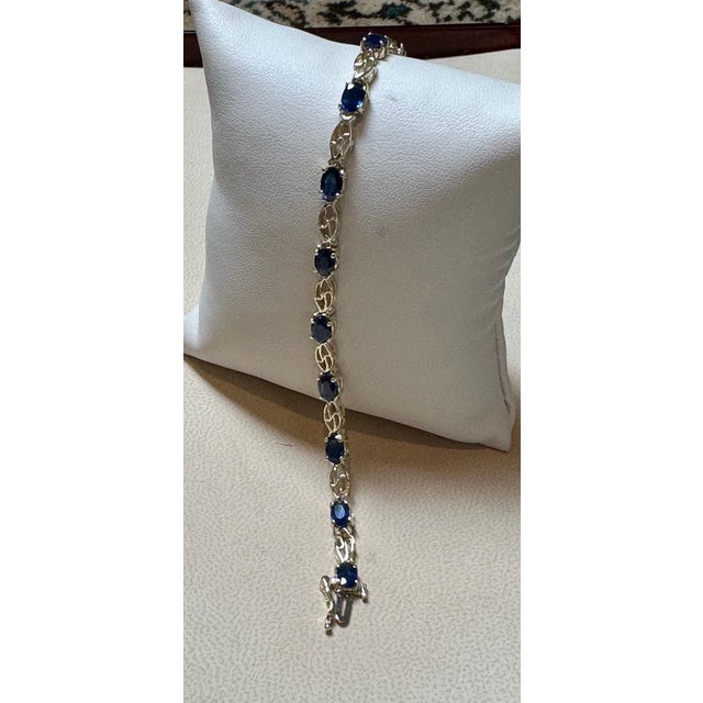 2010s 8Ct Natural Oval Blue Sapphire Tennis Bracelet 14 Karat Yellow Gold, 7 Inch Long For Sale - Image 5 of 18