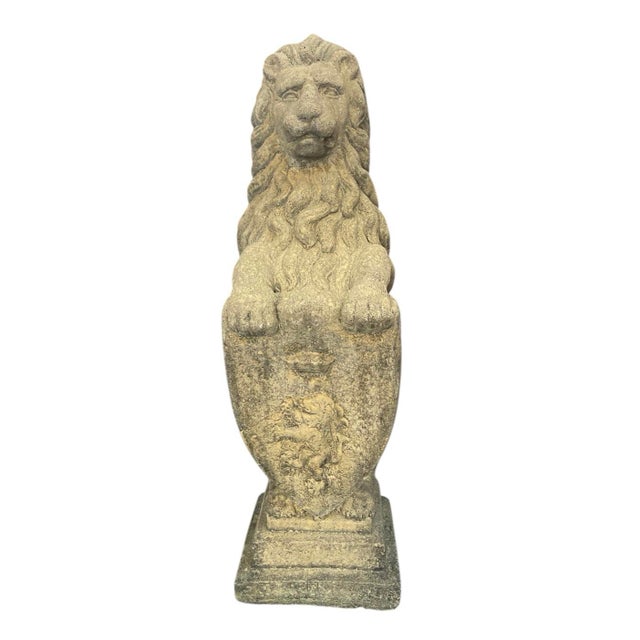 This impressive pair of seated lion statues offers a commanding presence for any entryway, garden path, or terrace....