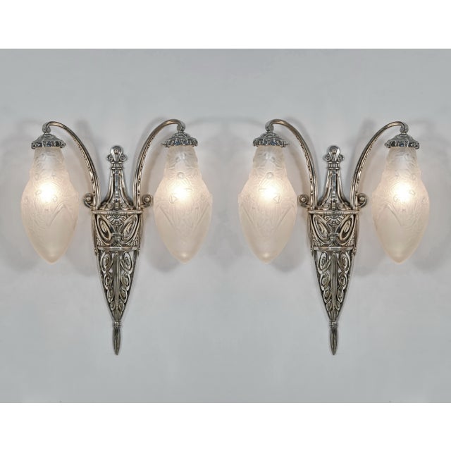 André Delatte A beautiful very large pair of 1930 French art deco wall sconces in nickel plated solid brass or bronze....