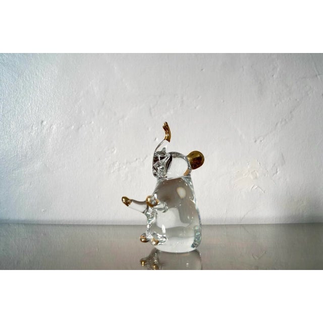 Vintage 1950's Hollywood Regency handblown glass elephant with gold tips. In excellent condition with no chips to the...