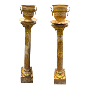 A Pair of Ormolu Mounted Onyx Pedestal Jardinieres by H. Journet