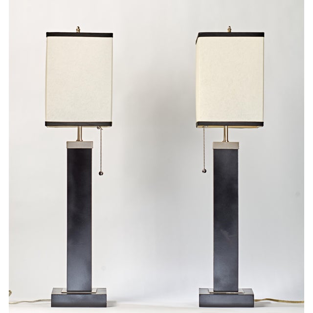 Nice pair of minimalist and modern lamps. Very masculine. Great for office or bedroom.