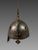 Indo-Persian "Kulah-Khud" Helmet . The helmet is made of engraved and damascened steel, decorated with an epigraphic...