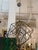 Design Plus Gallery presents the Roundout Nine-Light Chandelier by Hudson Valley Lighting. Intersecting hammered black...