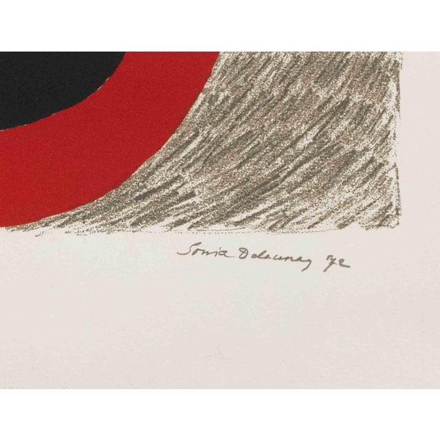 Color Lithograph on Arches paper realized by Sonia Delaunay in 1972. Hand signed in pencil, dated 72 and numbered 43/90....