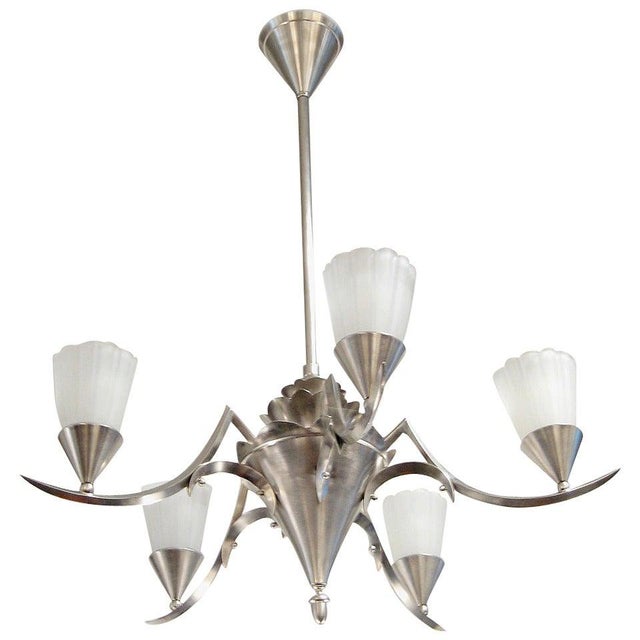 An Art Deco five-light chandelier designed by Schwintzer & Graeff.