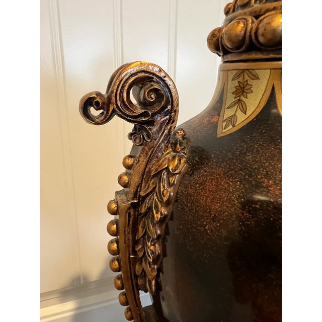 Classic style urn in browns and golds.