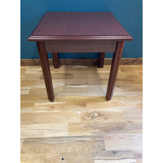 Very nice and heavy side table by Kimball. Made of solid cherry wood and very sturdy.