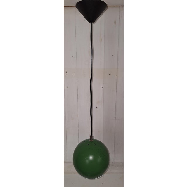 Vintage German Hanging Lamp with Green Spherical Metal Shade and White Aluminum Reflector, 1970s, in Good conditions....
